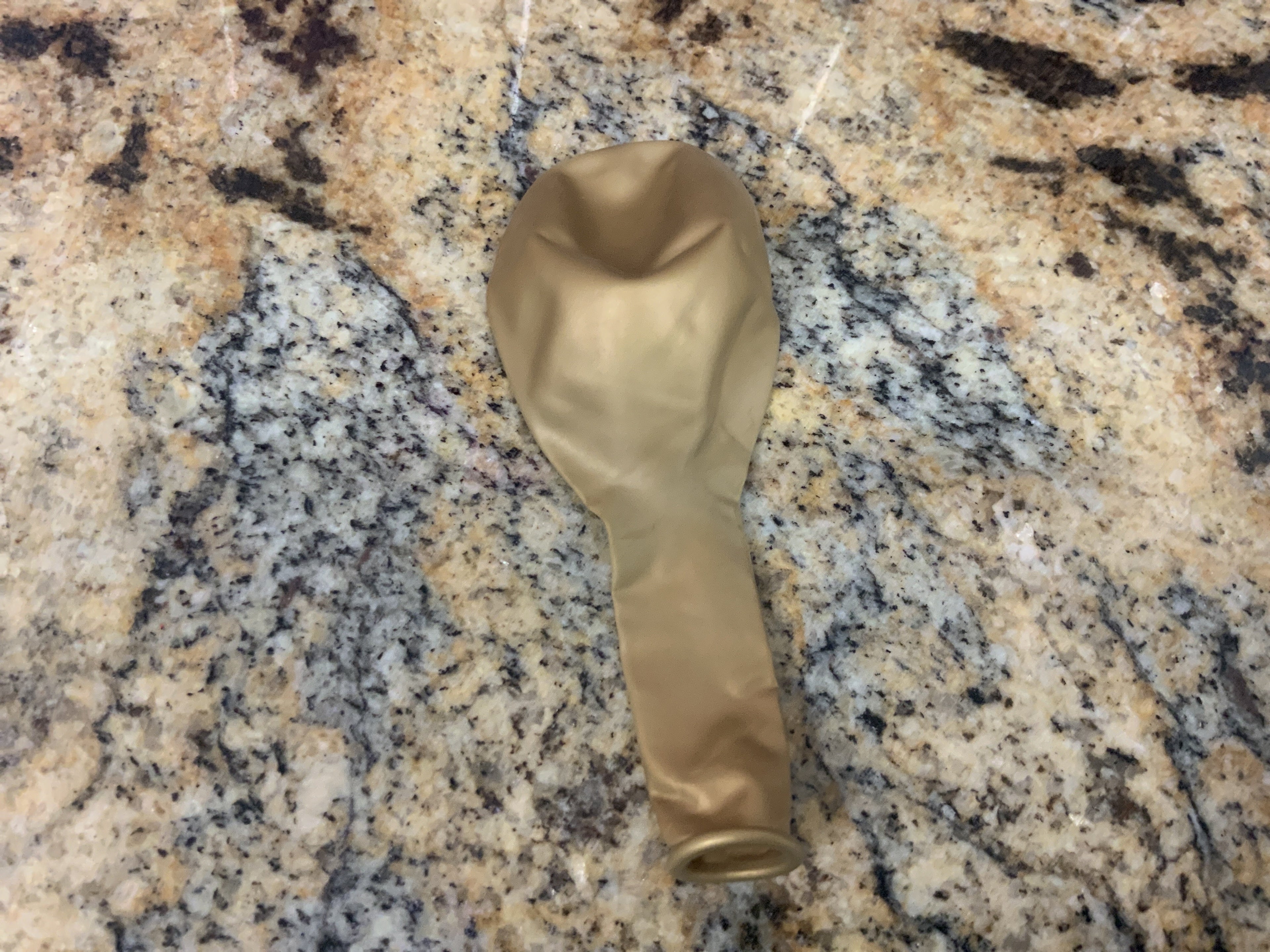 gold latex balloon